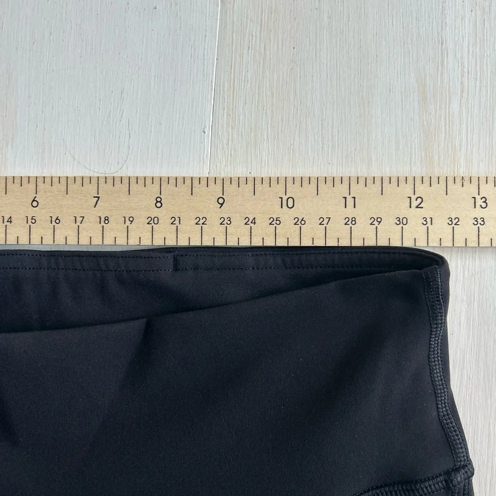 Lululemon Black Tied to It leggings.  Women's size 6, great condition!
